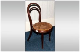Childs Bentwood Loop Back Chair with cane seat. C1900 26 inches high.