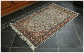 Persian Style Silk Prayer Rug in turquoise body colour. Decorated with traditional designs of