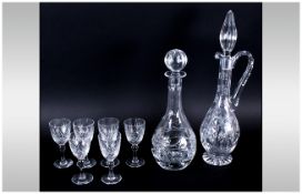 Two Cut Glass Decanters together with 6 sherry glasses.
