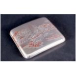 A Japanese Silver Cigarette Case with scenes of Japan landscapes with silver & copper images. Marked