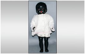 22 Inch 1950's Black Pedigree Doll, good condition, even has the ribbon loop in the Astrakhan