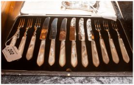 Set Of 12 Mother Of Pearl Handled Dessert Knives And Forks.