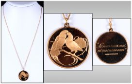 18ct Gold Lovebirds Medallion/Pendant fitted to an 18ct gold chain; fully hallmarked London 1975,