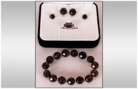 Smoky Quartz Bracelet, Earrings and Ring, the bracelet of faceted round beads with gold coloured