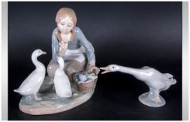Lladro Figure Group 'Feeding the Ducks'. 7.5 inches in height. Number 4849G/M, Retired 1995.