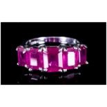 Ruby Five Stone Ring, 6.85cts of octagon cut, graduated rubies of good colour, set in a continuous