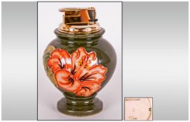 Moorcroft Table Lighter ' Coral Hibiscus ' On a Green Ground. 4.5 Inches High. Excellent Condition.