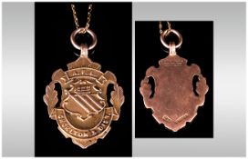 Fattorini and Sons 9ct Gold Fob/Medal and long chain, hallmarked Birmingham 1933, 9.1gms
