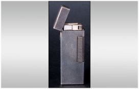 Dunhill Cigarette Lighter Engine Turned White Metal Body, Complete With Box And Paper Work.