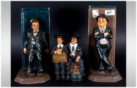 Pair Of Laurel And Hardy Book Ends together with Laurel and hardy figures wearing old school dress.