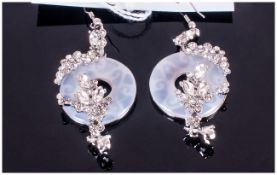 White Quartzite and Crystal Long Drop Earrings, each comprising an open circle of white quartzite