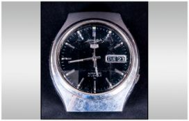 Seiko Gents Automatic Wristwatch, black dial, silvered battons and hands, with day date aperture,