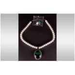 Emerald Green Crystal and White Glass Pearl Necklace and Earrings Set, a large emerald green oval