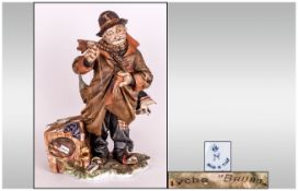 Capodimonte Signed Figure ' Tramp Sewing His Coat Pocket ' Signed Bruno. Stands 10.25 Inches High.