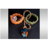 Murano Glass Pendant and Pair of Bracelets, the pendant being a marquise shape of turquoise, amber