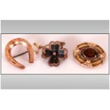 Victorian and Later Brooches, three comprising one oval, gold plated with oval, faceted dark