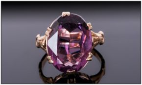 Amethyst Solitaire Ring, an oval cut held in a double prong setting in 9ct gold
