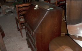 Dark Wood Writing Desk with Three Drawers.