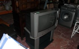 T.V. With Stand.