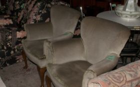 2 Green Upright Sitting Chairs.