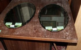 Pair of Oval Mirrors.