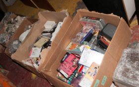 2 Boxes of Assorted CDS, Videos and Books.