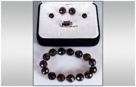 Smoky Quartz Bracelet, Earrings and Ring, the bracelet of faceted round beads with gold coloured