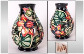 Moorcroft Tubelined Globual Shaped Vase. Palmata Design. Date 1999. Designer Shirley Hayes, Colour
