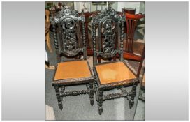 Pair Victorian Carved Oak Hall Chairs, in the bravarian style carved with grapes and vines to the