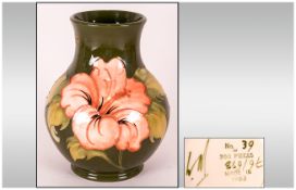 Moorcroft Ltd and Numbered Edition Large Vase ' Coral Hibiscus ' Design on Green Ground. No.39 of
