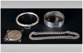 A Small Collection Of Silver Jewellery, comprising 2 silver bangles, 1 silver rope chain, 2 Maria