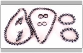 Two Sets of Hematite Jewellery each comprising a necklace of round beads with magnetic clasp, an