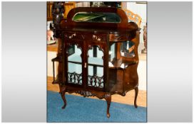 Mahogany Chiffoneer With Glazed Front And Sides, Mirrored Backs Raised On Short Cabriole Legs With