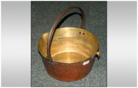 Large Copper and Brass Pan - With carrying handle. Approx 14 inches in diameter.