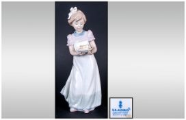 Lladro Figure Happy Birthday ' Young Girl with Cake ' Model Num.5429. Issued 1987. 7.75 Inches Tall.