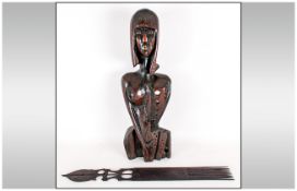 Modernist Wood Sculpture in the form of a African stylised figure 24 inches high. Together with a