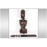 Modernist Wood Sculpture in the form of a African stylised figure 24 inches high. Together with a
