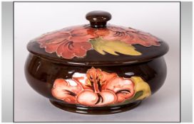Moorcroft Lidded Powder Bowl ' Coral Hibiscus ' Pattern, on Chocolate Coloured Ground. 3 Inches