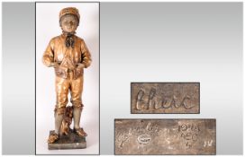 19th Century Gilded Terracotta Goldscheider Figure Of A Boy, in fur hat and breeches with his
