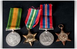 Set Of Four WW2 Medals Including Pacific Star 1939-45, The Star 1939-45, Defence Medal & Serving