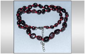 Red Garnet Bead Necklace, polished, ovoid, Indian red garnets, knotted onto red silk and fastened