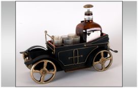 Novelty Musical Decanter Set in the form of a vintage car.