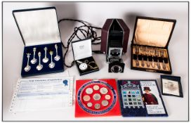 Assorted Collectables including United Kingdom Coin Sets, cased dessert forks, Voigtlander Projector