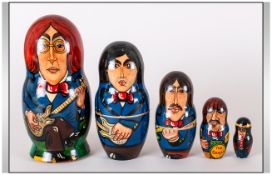 Set Of Five Russian Babushka Dolls In The Form Of The Beatles. circa 1960's style