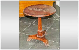 Small Regency Style Wine Table In Mahogany with round top, supported by a shaped centre column on