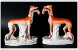Staffordshire Mid 19th Century Pair of Large Figures of Whippets with Hares. c.1860's. A/F. Each