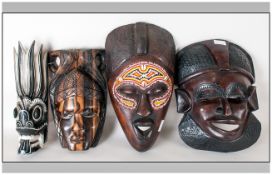 Collection Of 4 Various Decorative Carved Tribal Masks