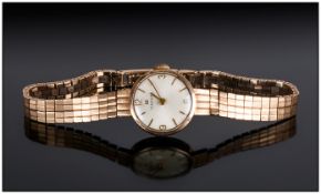 Tissot Ladies 9ct Gold Mechanical Wristwatch with integral 9ct gold bracelet. Fully hallmarked and