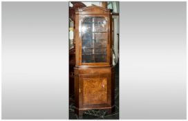 Walnut Queen Anne Style Reproduction Corner Cupboard with a single door glazed top, with cupboard