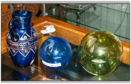 Collection Of Glass Comprising Crystal Blue And Green Floats Together With A Blue Glass Jug.